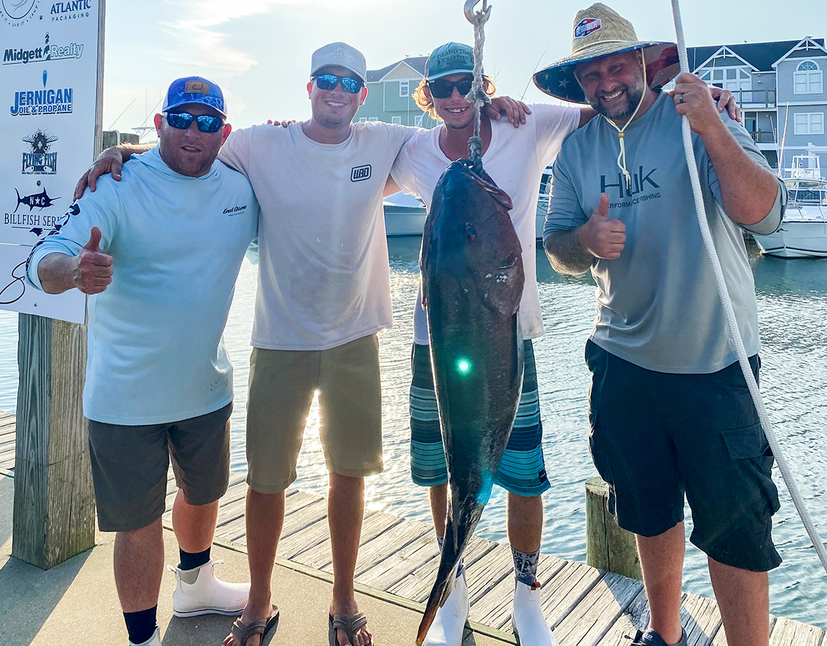 Thomas M. Madsen, far right, of Byram, New Jersey, caught the 58-pound, 8-ounce fish Aug. 3 off Cape Hatteras with Sea Dream Fishing Charters. Photo: Division of Marine Fisheries