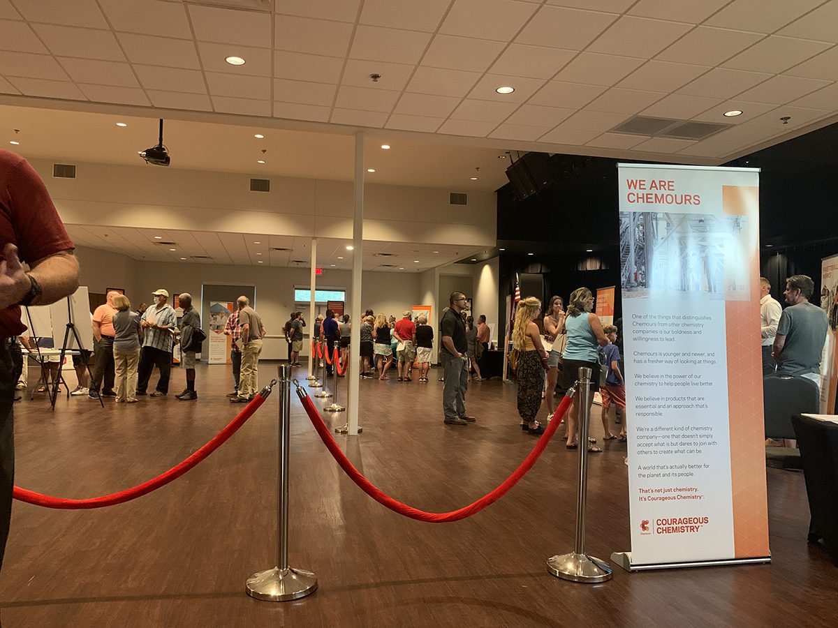 Open house attendees are led Wednesday in groups of 10 from table to table where Chemours officials discuss the company’s Fayetteville plant, products made at the plant, expansion plans and emissions remediations. Photo: Trista Talton