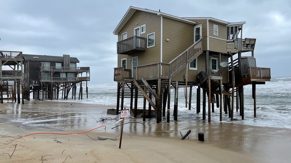 Two houses that collapsed May 10 are shown in this Cape Hatteras National Seashore photo from the previous day.