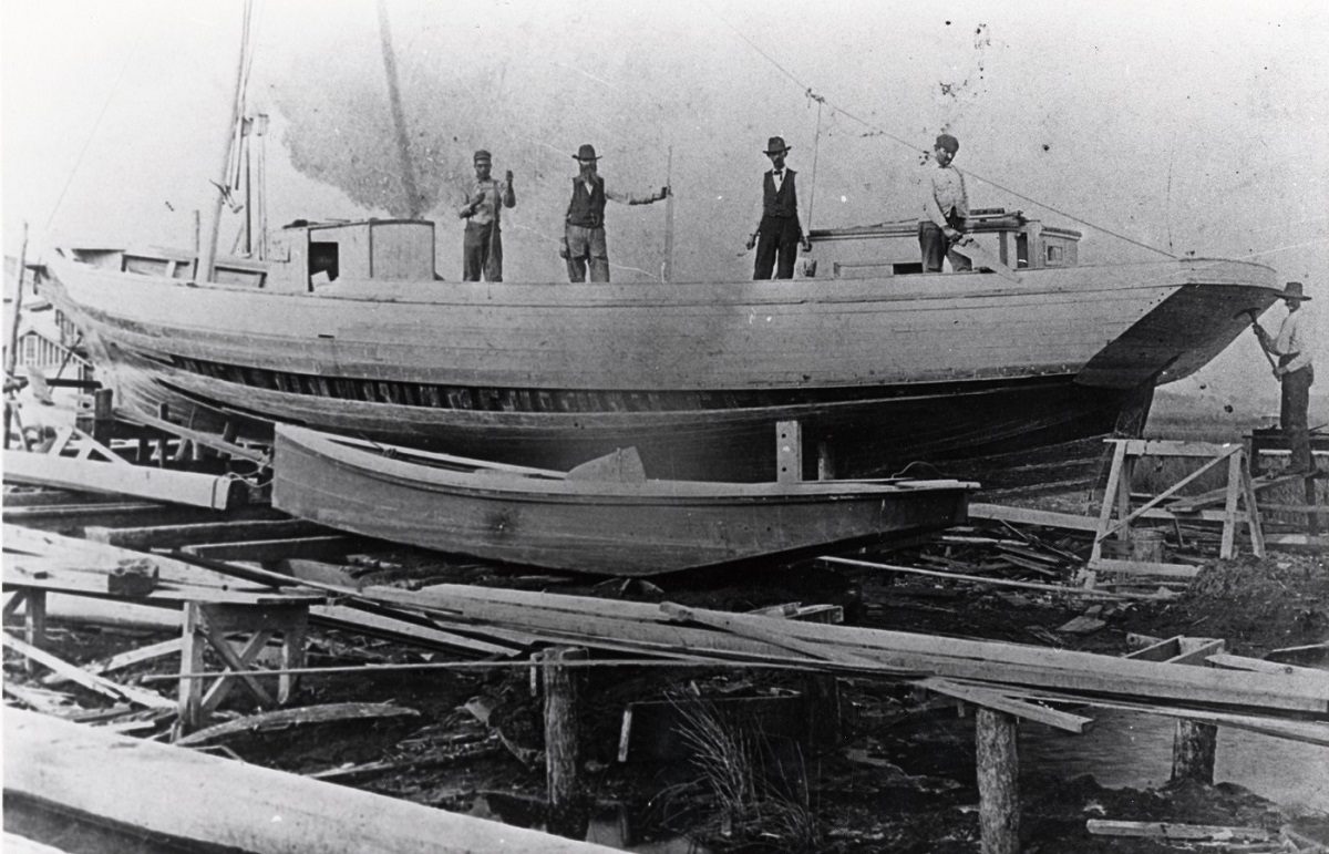 Employees of Creef Boatworks in Wanchese are shown on a schooner under construction. Photo courtesy Outer Banks History Center, Manteo.