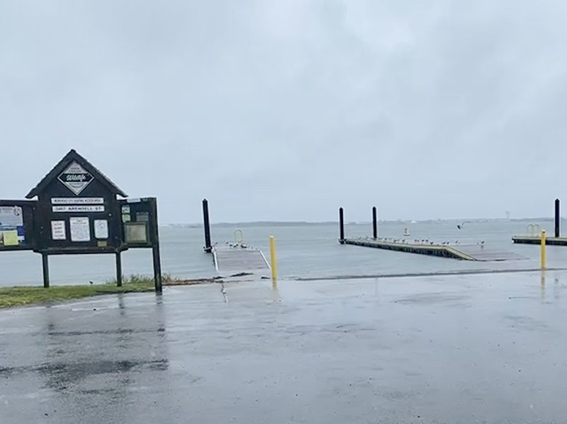 Bogue Sound nearly reaches the parking lot during high tide at 11:30 a.m. Friday at the Morehead City boat ramps. Photo: Gordon Churchill