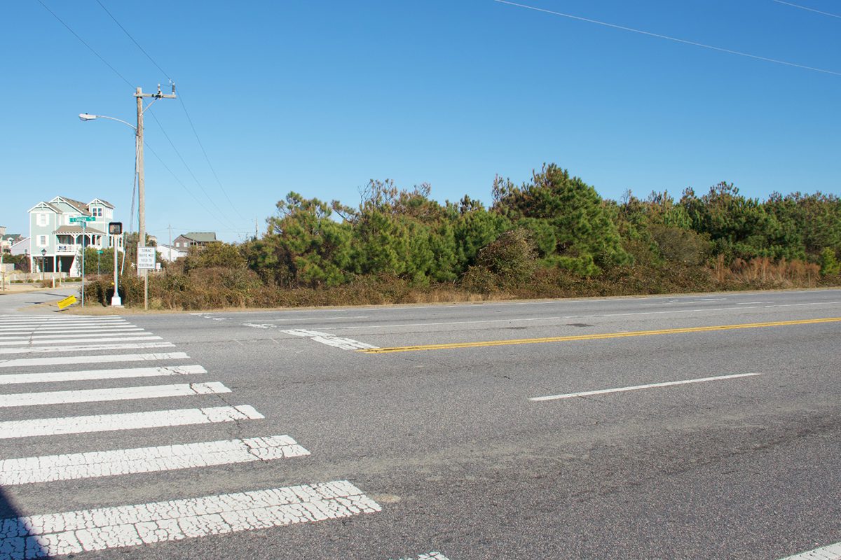 Shown is a view from Croatan Highway looking east at the tract proposed for the multifamily workforce housing development. Photo: Kip Tabb