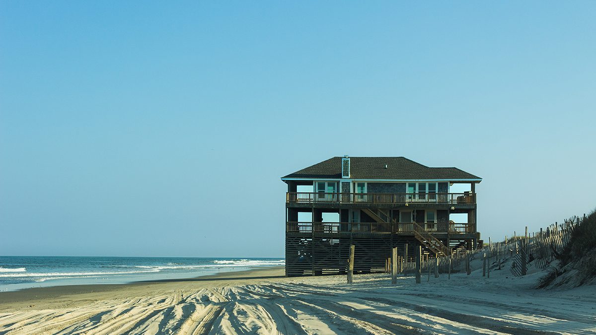 The Laughing Gull, a rental property on the Carova beach, is one of the only oceanfront houses left in front of the dunes. Photo: Josee Molavi