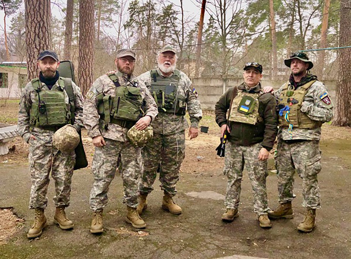 Randy Sturgill, center, poses with Ukrainian soldiers in Ukraine. Photo: Contributed