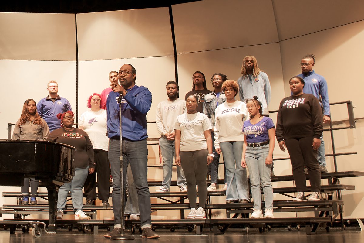 Director Dr. Walter Swan introduces the Elizabeth City State University Choir at its performance Jan. 14 in Kill Devil Hills during a celebration of Martin Luther King's birthday. Photo: Kip Tabb