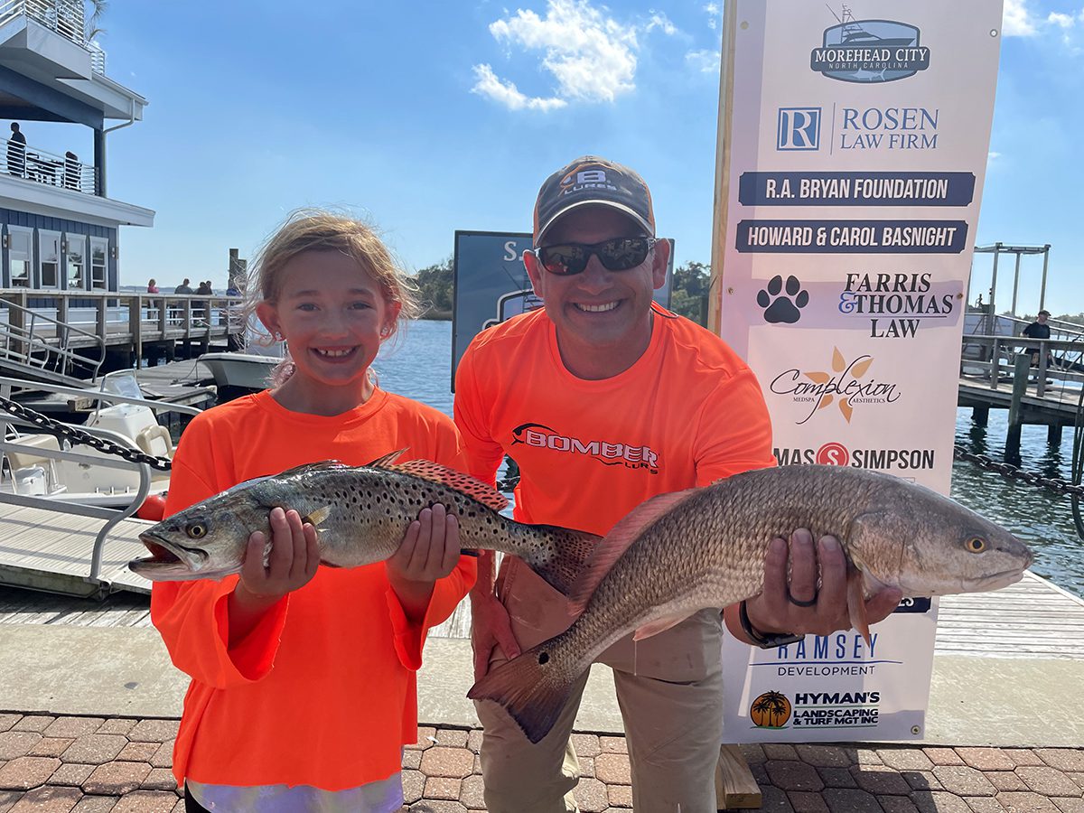 Josie and Dave Bernstein show off their catch on the Morehead City waterfront. Photo: Contributed