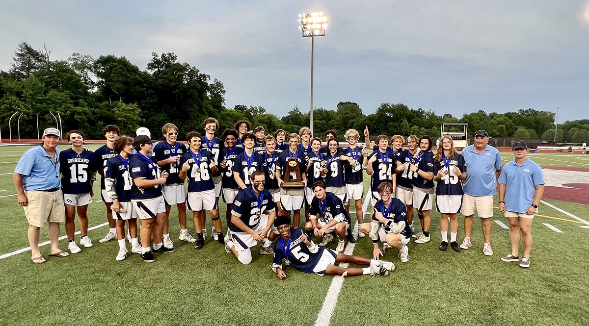 Coach Gilbert, second from right, and the Cape Fear Academy Hurricanes after winning the championship. Photo: Contributed