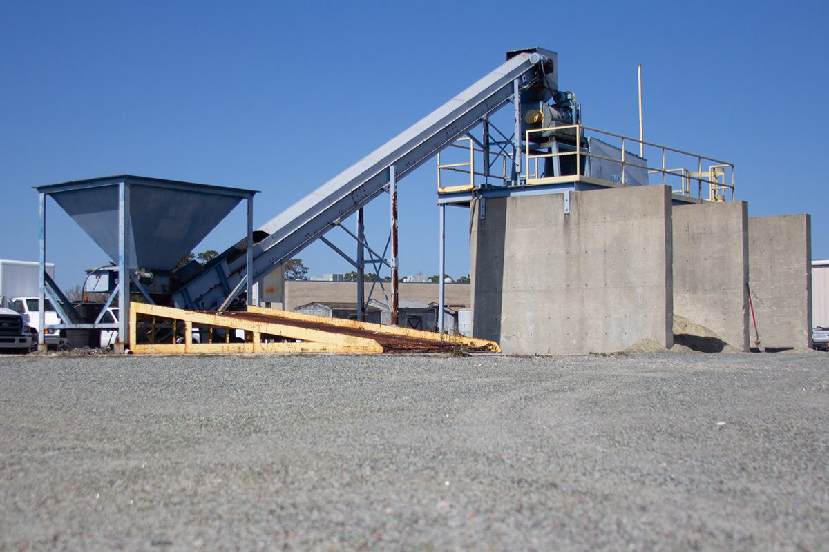 The glass crusher at the Dare County Public Works Compound in Manteo is the final stop for recycled glass bottles collected from county recycling facilities. Once processed, the glass becomes either landscaping pebbles or sand that residents can use. Photo: Corinne Saunders