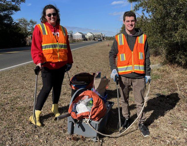 Volunteers pause for a photo during a past roadside cleanup. Photo: N.C. Coastal Federation