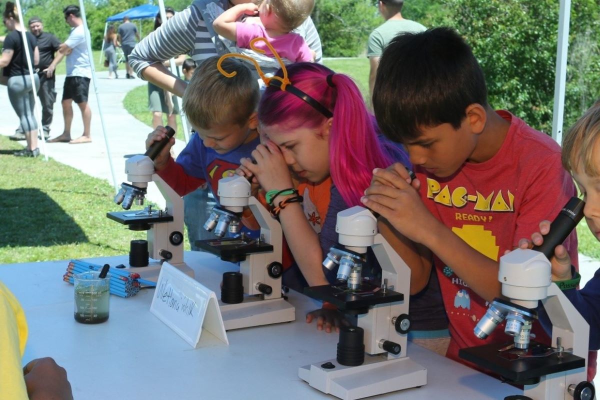 A hands-on station engages young scientists during a past Sturgeon City Earth Day celebration. Photo: Sturgeon City