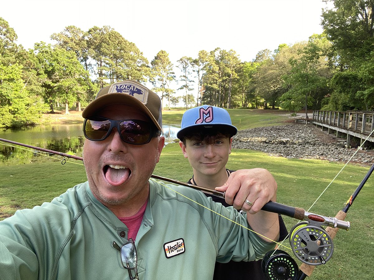 Chris and Emerson Ellis enjoy fly fishing on backyard ponds. Photo: Contributed