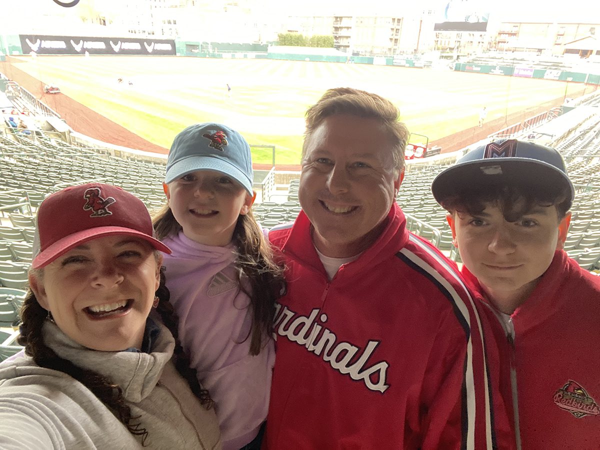 The Ellises, Rachel, Lelaina, Chris, and Emerson, take in a game at their favorite major league team’s stadium. Photo: Contributed