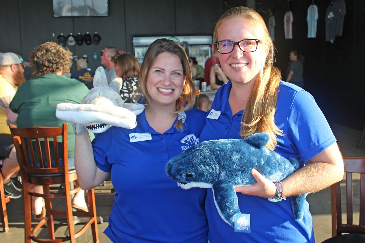 N.C. Aquarium at Pine Knoll Shores staff at a past Suds for Sharks. fundraiser for shark conservation and research 5:30 p.m. – 8 p.m. Friday, May 19 at Crystal Coast Brewing Company 219 West Fort Macon Road, Atlantic Beach. Photo: NC Aquariums