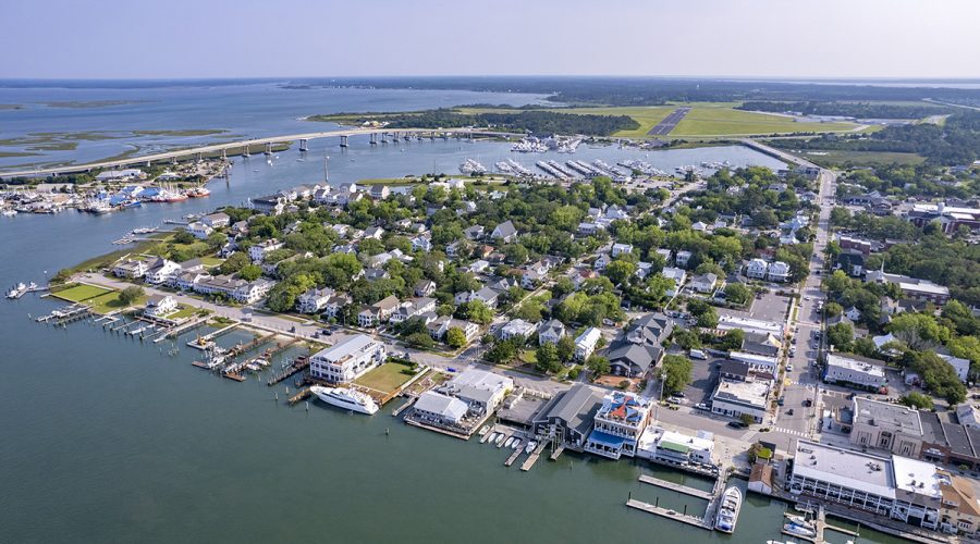 This aerial view of Beaufort includes the intersection of Front and Turner streets, lower right, the U.S. Highway 70 bridge over Gallants Channel, upper left, and Michael J. Smith Field, upper right. Photo: Dylan Ray