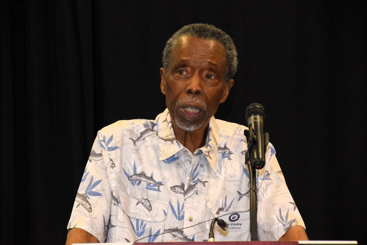 Dr. Don Ensley, the first board president when the North Carolina Coastal Federation was formed in 1982, accepts his coastwide Pelican Award during the 2022 event. Photo: Mark Hibbs