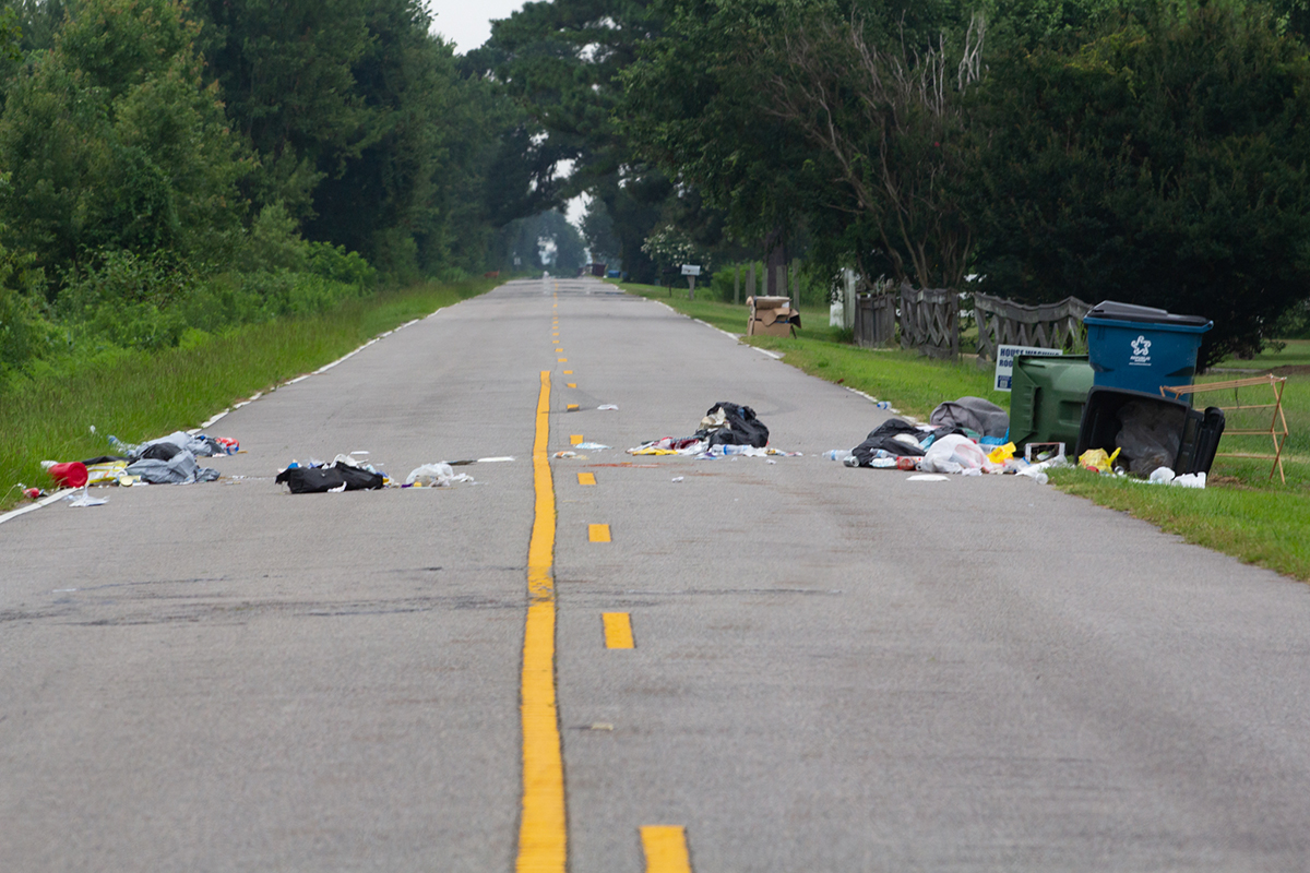 Trash is strewn across Shore Drive on Pocosin Lakes National Wildlife Refuge in early July. The road runs just south of Lake Phelps and several miles north of Pungo Lake. Photo: Corinne Saunders