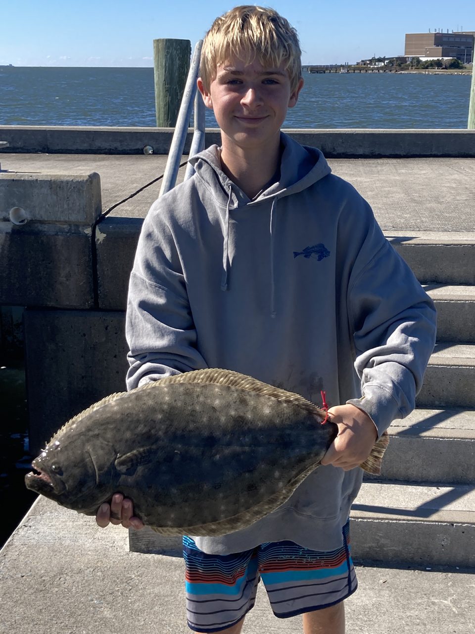 Sheldon Batsavage shows off a big flounder. Photo: Contributed