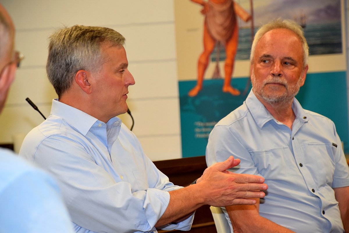 North Carolina Attorney General Josh Stein, left, speaks with North Carolina Coastal Federation Executive Director Todd Miller Tuesday during a meeting with Pine Knoll Shores officials and Coastal Federation staff to discuss the state Environmental Enhancement Grant program that the AG's office administers. Photo: Mark Hibbs