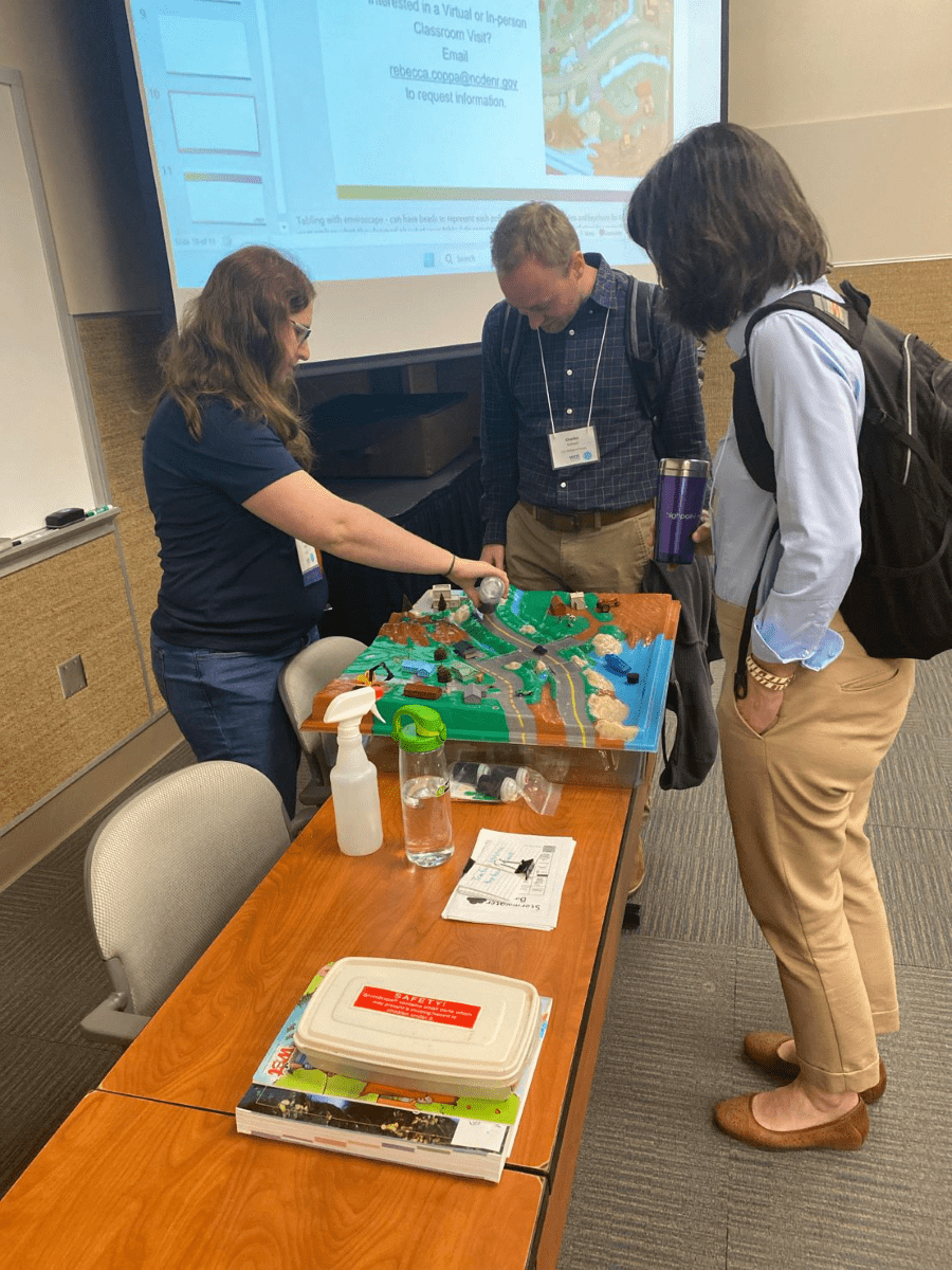 Sediment Education Engineer Rebecca Coppa demonstrates Enviroscape during the North Carolina Water Resources Research Institute’s annual conference earlier this year in Raleigh. Photo: NCDEQ
