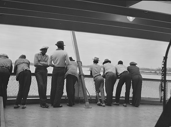 On the Norfolk-Cape Charles ferry, 1940. This group of migrant laborers had finished the potato harvest in Camden County, N.C., and were headed to a new job on the Eastern Shore of Virginia. Photo by Jack Delano. Courtesy, Library of Congress

