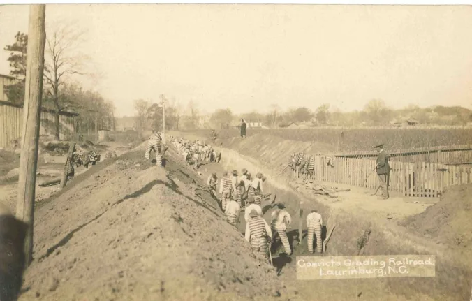 By 1935, the vast majority of convict laborers were forced to work either on the state’s roads or on farms. In an earlier era, though, thousands of convict laborers worked on railroad construction projects. This scene is from Scotland County, N.C., ca. 1900. Photo courtesy of Henry McKinnon. From The Growing Change History Project, a public history project created to support the research and interpretation of a former prison in Wagram, N.C.
