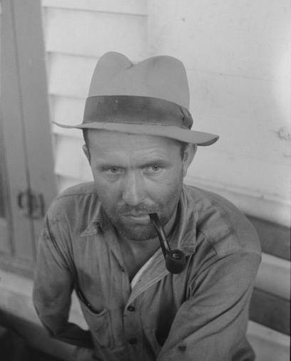 A farm worker from Texas at the potato grading station in Belcross, N.C. He was making 20 cents at hour. According to Jack Delano, the man dreamed of having his own sweet potato farm one day. Courtesy, Library of Congress

