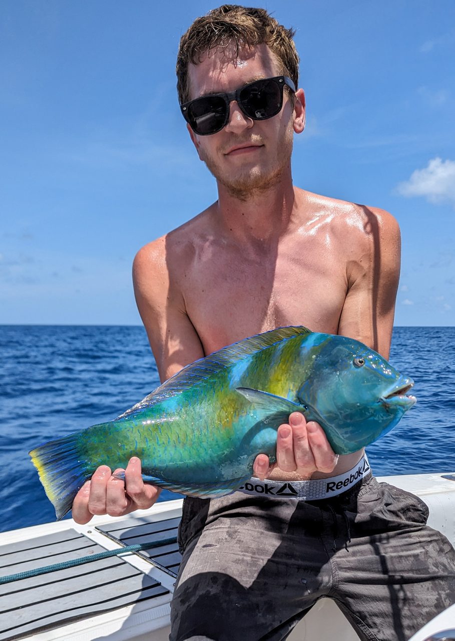 Connor Stone of Southport shows off his 3-pound, 11-ounce puddingwife wrasse. Photo: Division of Marine Fisheries