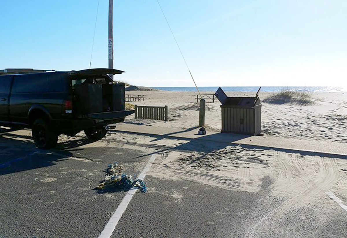 North Carolina Beach Buggy Association volunteers collect trash and empty receptacles during the 2018-19 government shutdown. Photo: Island Free Press