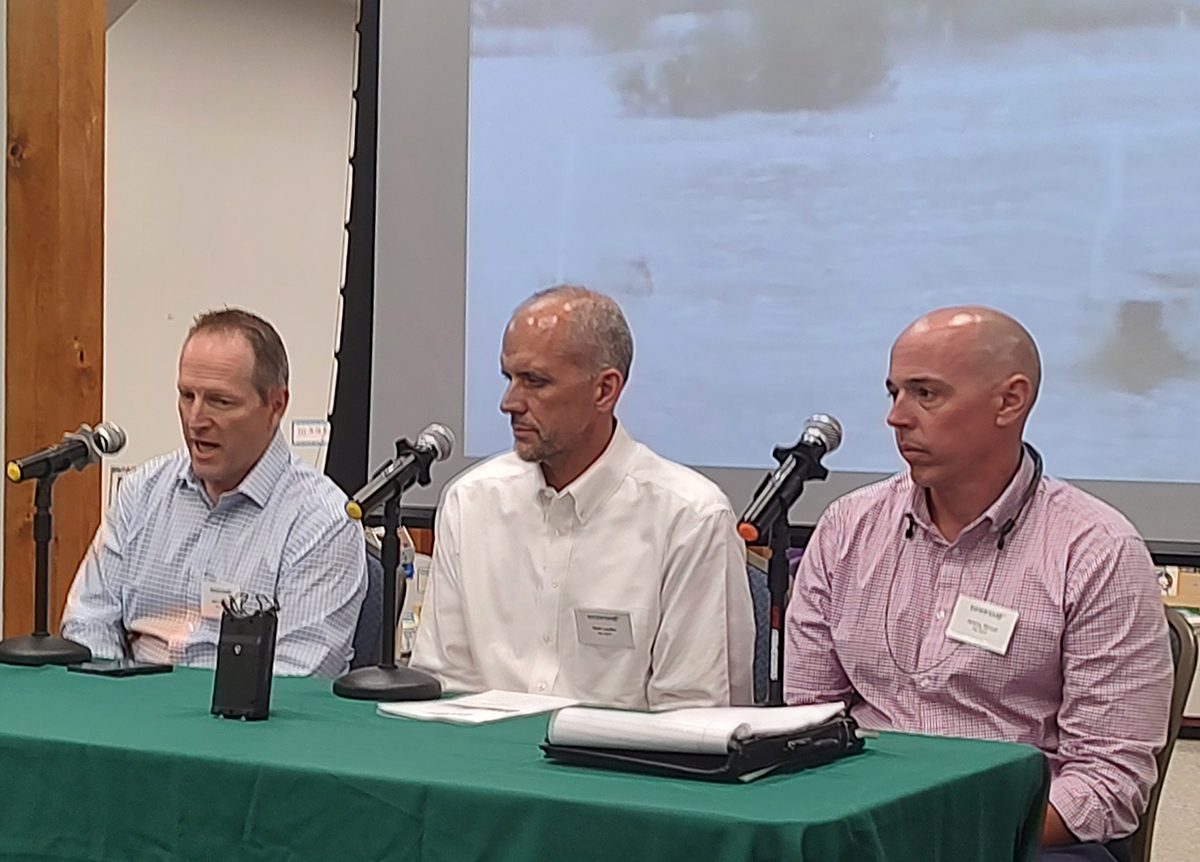 N.C. Department of Transportation Division 2 Engineer Jeff Cabaniss, Assistant State Hydraulic Engineer Matt Lauffer and Assistant State Hydraulic Engineer Matt Lauffer, nd Division 2 Deputy Engineer Jeremy Stroud answer questions during a community conversation at Core Sound Waterfowl Museum and Heritage Center on Harkers Island. Photo: Jennifer Allen