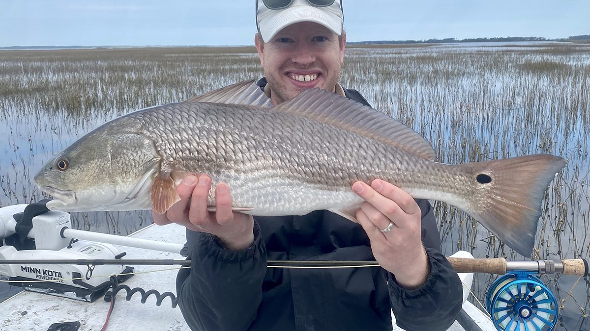 Evan Dintaman of Virginia shows off a lovely redfish caught during the last days of October. Photo: Gordon Churchill