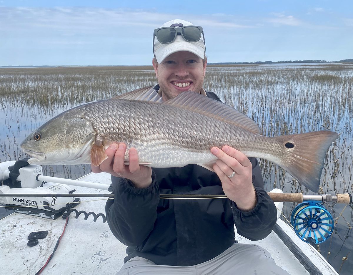 Evan Dintaman of Virginia shows off a lovely redfish caught during the last days of October. Photo: Gordon Churchill