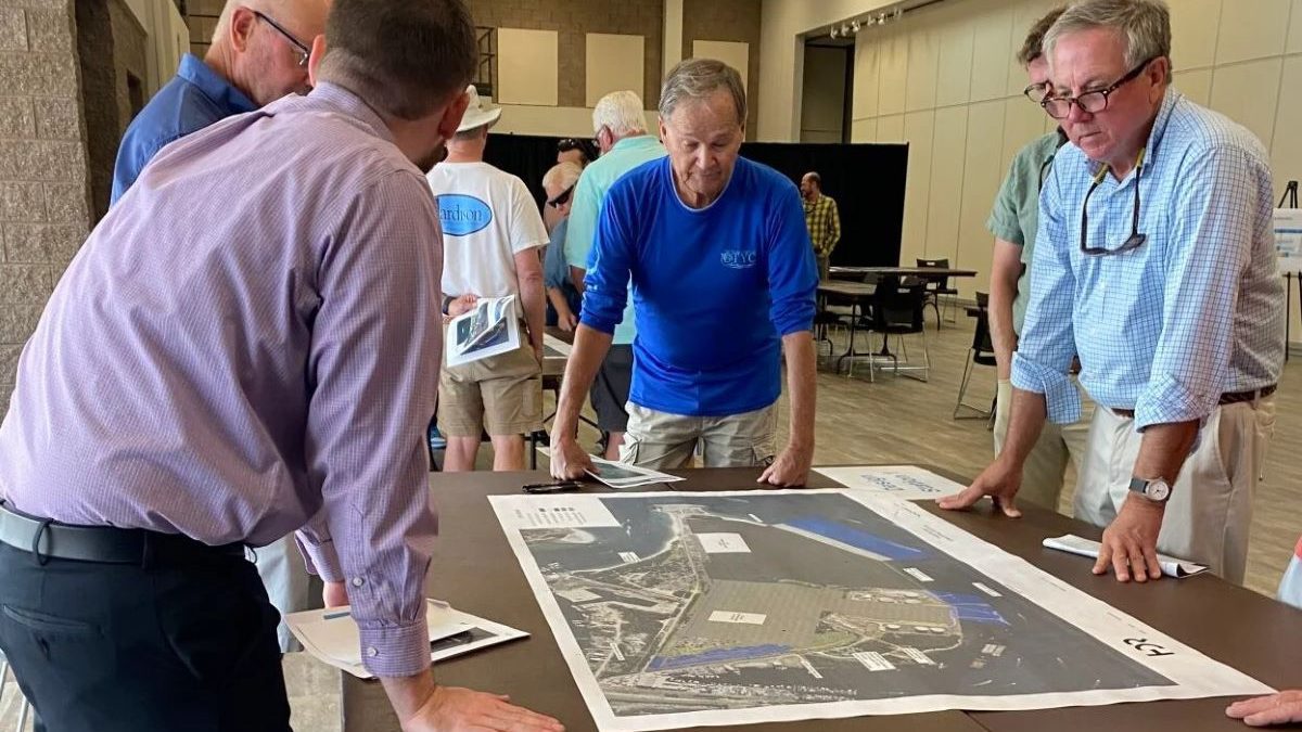 County residents look at maps and ask question during a public information session Tuesday about a plan to build a new multi-use terminal at the N.C. Port of Morehead City on Radio Island. Photo: Carteret County News-Times