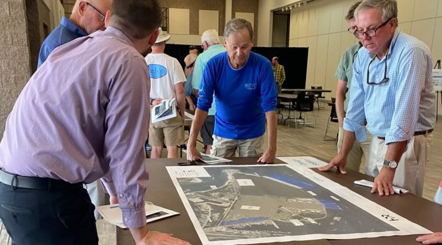 County residents look at maps and ask question during a public information session Tuesday about a plan to build a new multi-use terminal at the N.C. Port of Morehead City on Radio Island. Photo: Carteret County News-Times