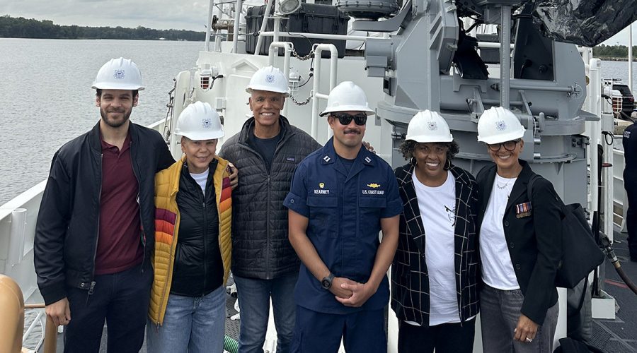 Joan Collins, second from right, and members of her family are shown onboard the deck of the U.S. Coast Guard Cutter Richard Etheridge at the Baltimore Shipyard with Lt. Zackary Kearney the vessel’s commander. From left are Patrick Jefferson, Deborah Jefferson, Marshall Collins, Lt. Kearney, Joan Collins, and Sharon Warner. Photo: Sharon Warner