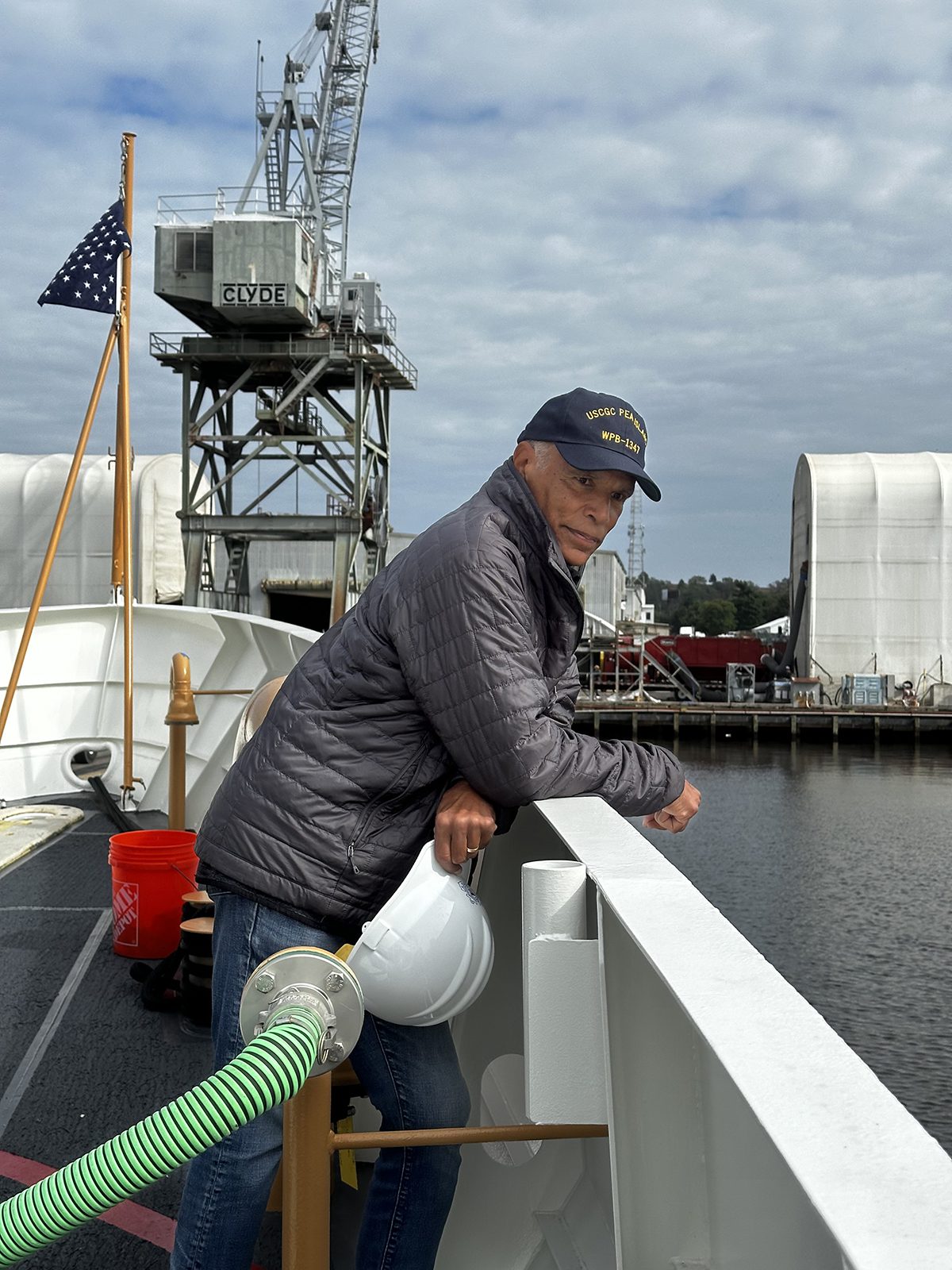 Marshall Collins, the late Lt. Herbert M. Collins’ son, stands on the deck of the cutter thinking about his father’s experiences when he worked on a cutter as a mess attendant in 1939. Photo: Sharon Warner