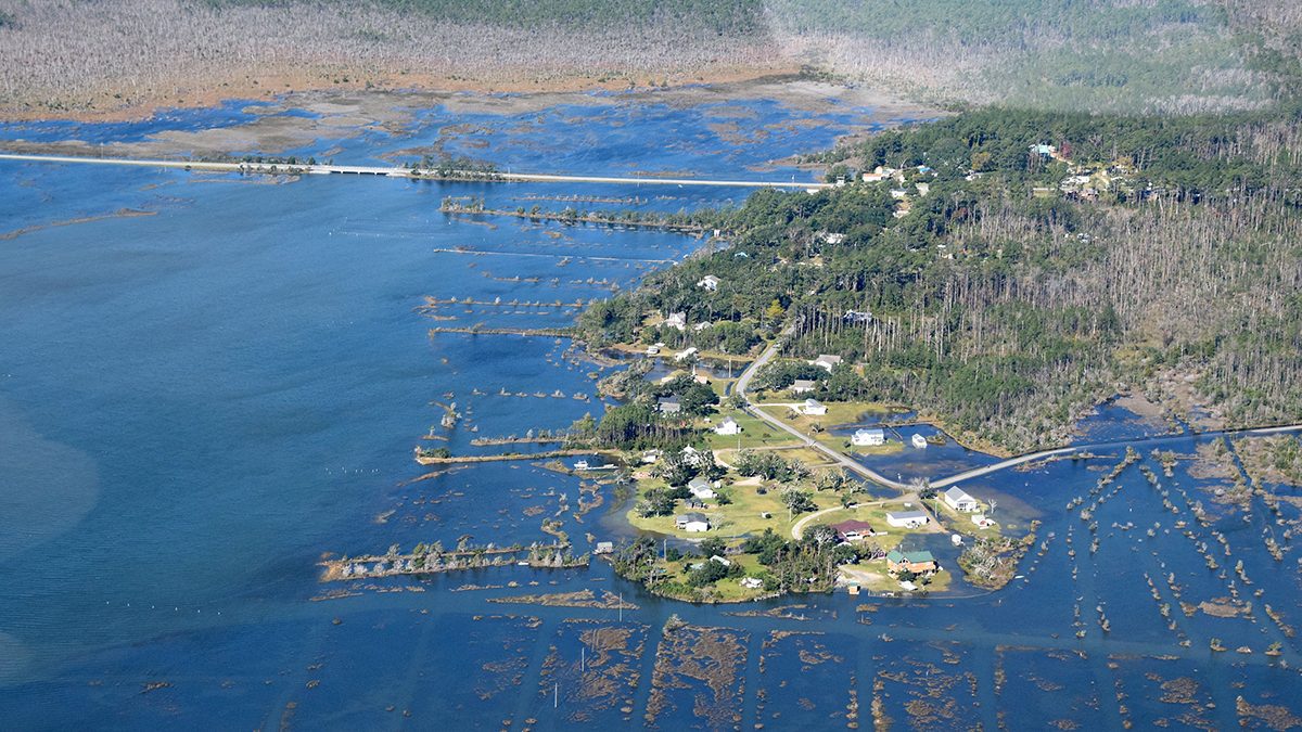 Part of Stacy Loop Road in Down East Carteret County is submerged by a king tide in this Nov. 8, 2021, flight that was part of the King Tides Project. The U.S. 70 bridge extends from the top left. Photo: Mark Hibbs/Southwings