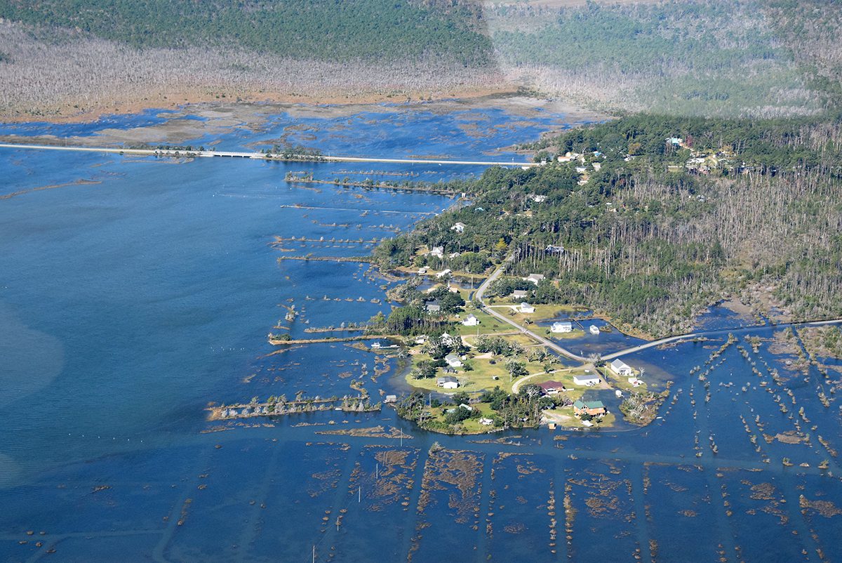 Part of Stacy Loop Road in Down East Carteret County is submerged by a king tide in this Nov. 8, 2021, flight that was part of the King Tides Project. The U.S. 70 bridge extends from the top left. Photo: Mark Hibbs/Southwings