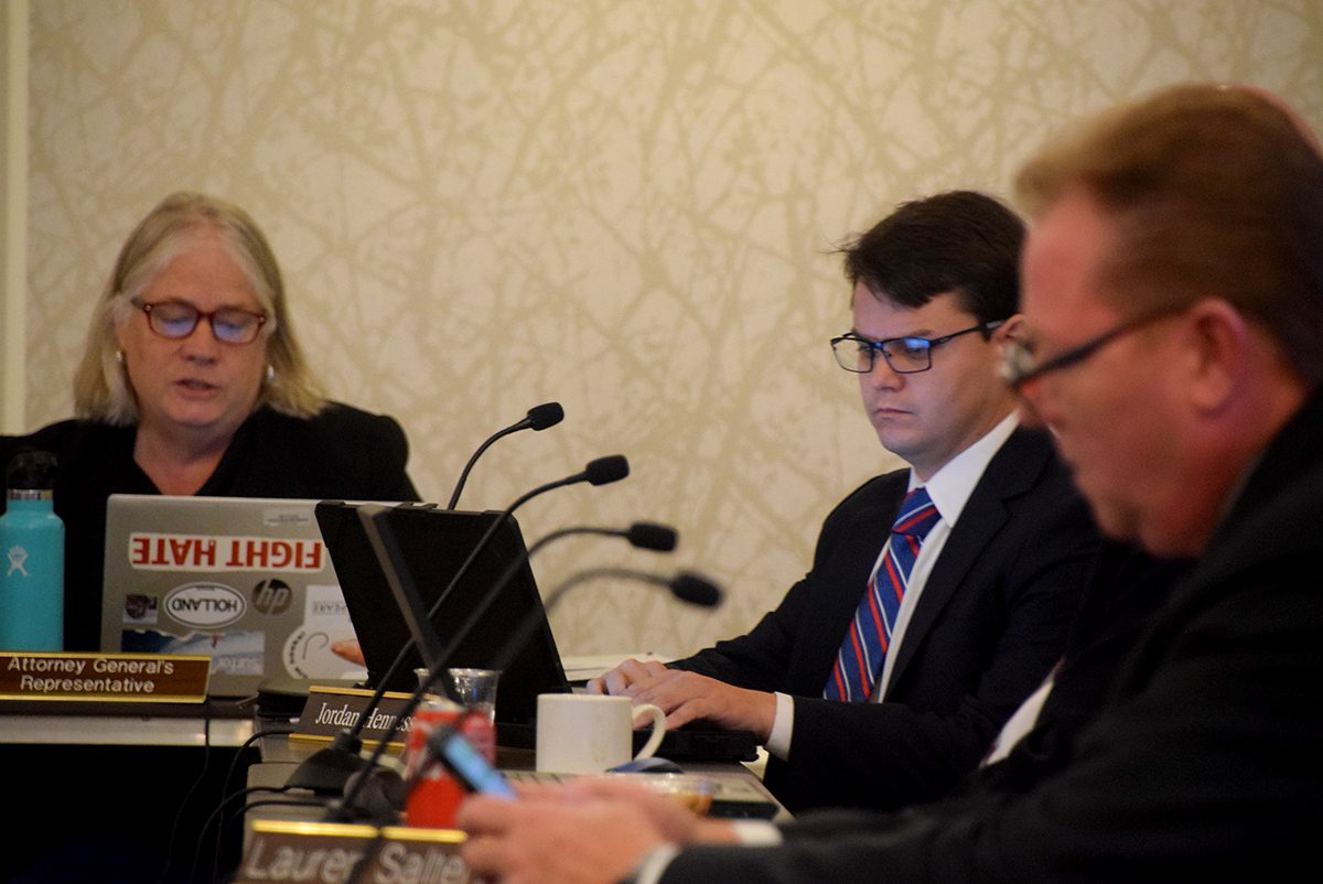 Coastal Resources Commission legal counsel Mary Lucasse, left, is seated next to new commission member Jordan Hennessy Thursday during the commission's meeting in Beaufort. Photo: Mark Hibbs