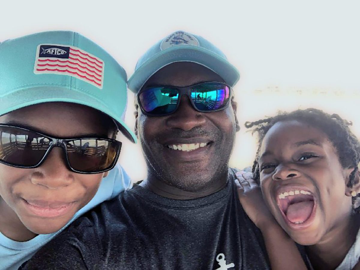 Tim Still of Havelock, creator of Beach Bum Lures, enjoys spending time with his family, including two of his younger children shown here. Photo: Contributed.