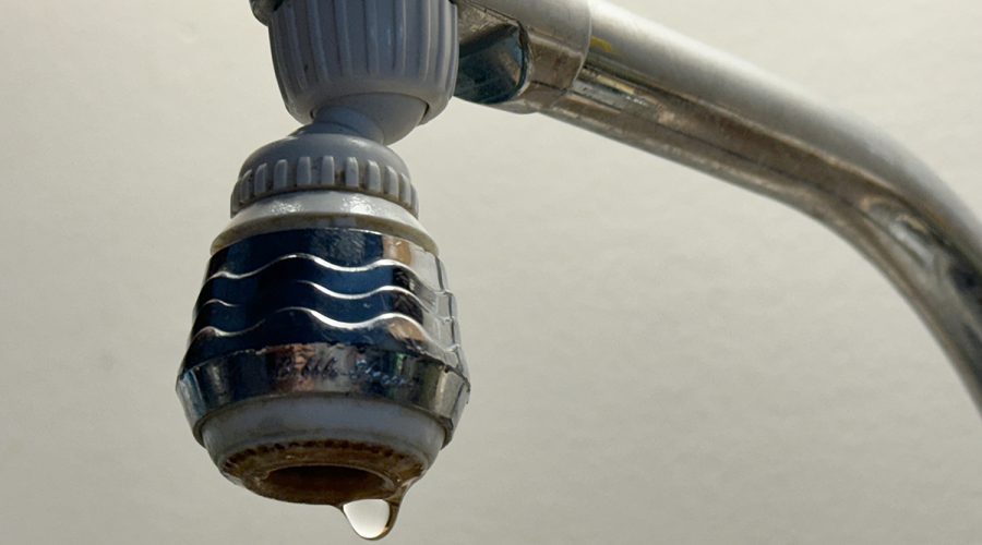 Water drips from a faucet. Photo: Mark Hibbs