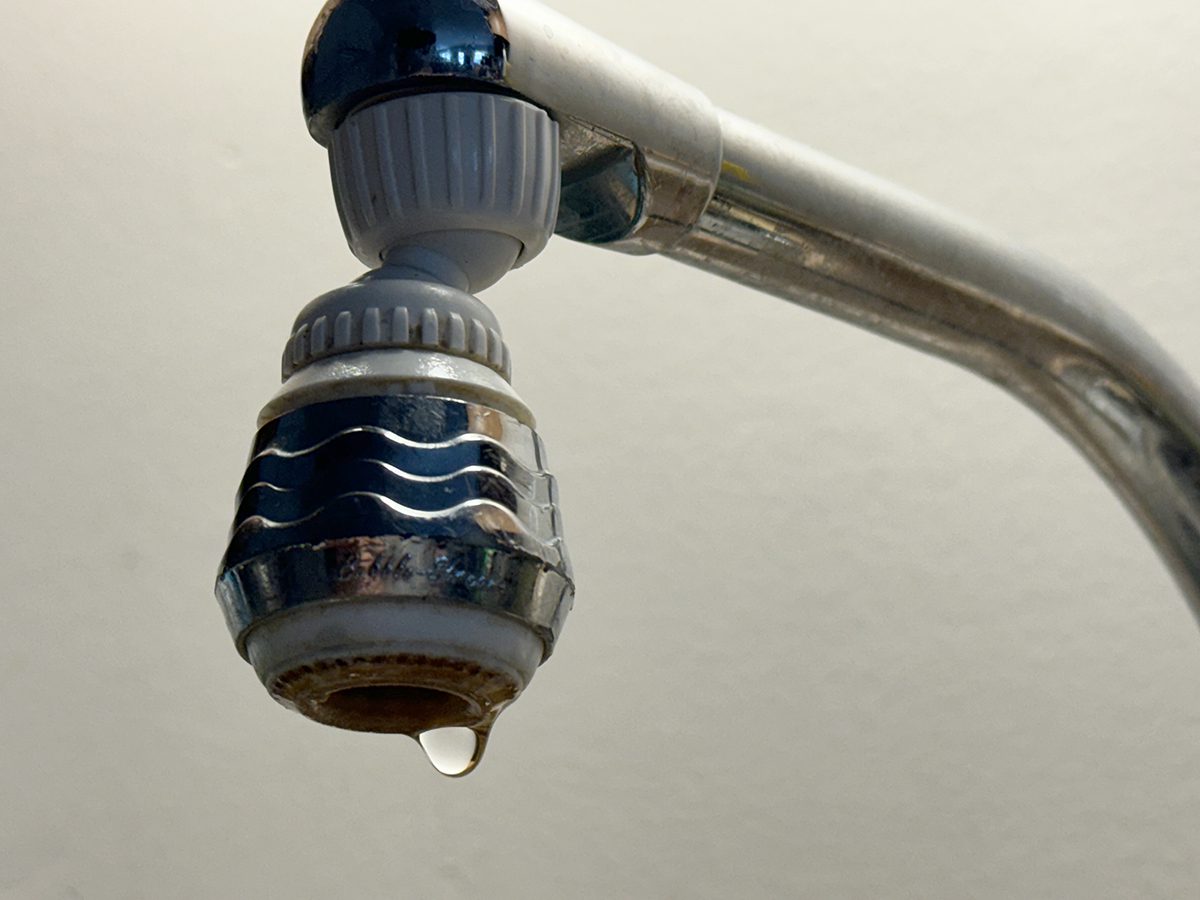 Water drips from a faucet. North Carolina has the largest population in the country of people who get their drinking water from private wells. Photo: Mark Hibbs