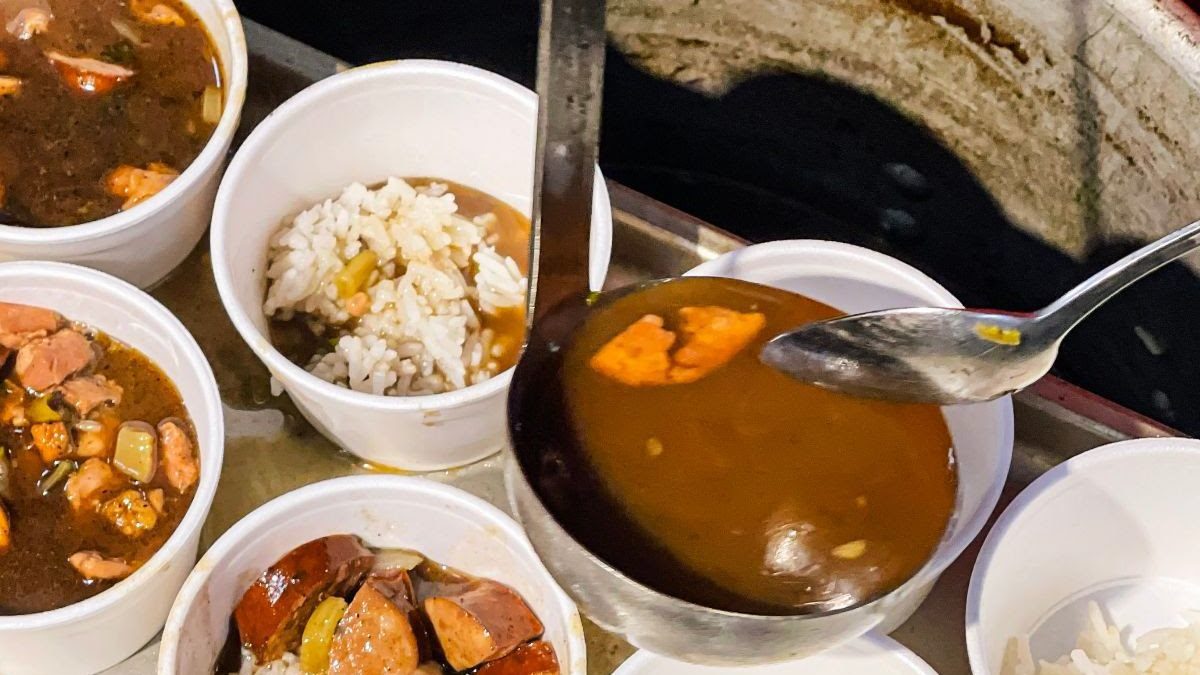 Volunteers serve gumbo during the first Core Sound Chow Down in 2022, a part of the Waterfowl Weekend at Core Sound Waterfowl Museum and Heritage Center. Photo: CSWMHC