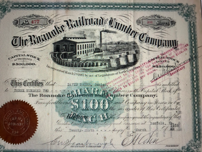 Stock certificate for the Roanoke Railroad & Lumber Co., 1928. In the 1880s, a Philadelphia lumber baron named Clarence Branning established a lumber mill village called Bayside on the Pamlico River, 12 miles southwest of Belhaven. His company also built a logging railroad, the Bayside & Yeatesville, that connected the mill to timber holdings in Yeatesville, Bath, and Pamlico Beach. Branning sold the mill, railroad, and the village–  “everything except the walnut desk belonging to Mr. Branning,” according to one source– to the Roanoke Railroad & Lumber Co. in 1887. Life in Bayside revolved around the mill and the lumber trains until 1919, when the mill burned. After the company left Bayside for good, the village’s name was changed to Bayview and it gradually became the little community that it is today. Note: According to a reminiscence later published in the Nashville Graphic (Nashville, N.C., 23 June 1953), the Roanoke Railroad &  Lumber Co. brought in “Russian, Italian and Arabian workers” to work at its mill in Momeyer, in a different part of eastern N.C. I would expect that the company also employed a significant number of immigrant laborers at its mill in Bayside.

