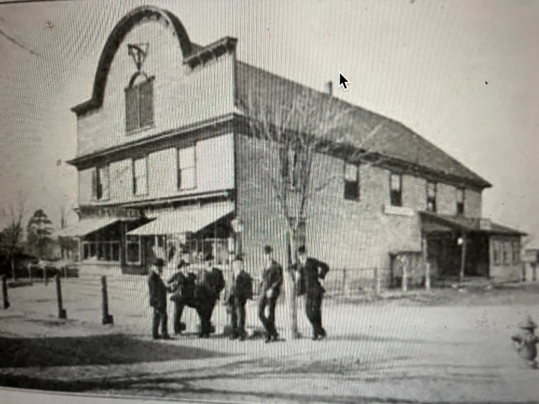 The John L. Roper Lumber Co.’s company store in yet another lumber boomtown–  Roper,  10 miles north of the Pungo’s headwaters, ca. 1907. Lee’s Mill– the name of the settlement until the company arrived in 1889– had been the site of small-scale shingle and lumber mills since the 1700s. Prior to the Civil War, local milling companies loaded their wood products onto flatboats and floated them down Kendrick Creek to the Albemarle Sound, where they were transferred onto sloops and schooners for shipment north. When the John L. Roper Lumber Co. and the Norfolk & Southern Railroad arrived however,  everything changed, including the village’s name. Hundreds of new residents moved to Roper to work in the company’s mills. Electric lights illuminated the streets. Shops, boardinghouses, inns, and taverns and the like opened in the booming village, as did the impressive company store that we see here, which was part grocery, part hardware store, part pharmacy, and part bank (or perhaps more accurately, part payday lender). Trains came and went several times a day, and the voices of people from all over the U.S. and other nations  could be heard in the village streets. Photo from American Lumberman, April 27, 1907.
