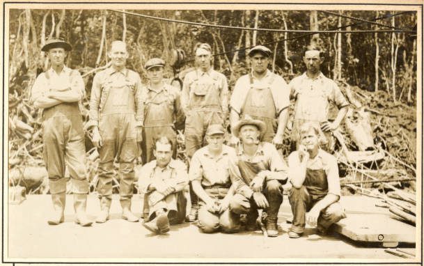 This is derrick barge No. 14’s crew evidently on the banks of the Scuppernong, May 1931.  Any job in that early part of the Great Depression was a good job, but a dredge crewman’s life was no bed of roses.  They worked long hours, typically seven days a week, lived on the boat, and often had to stay away from home for months at a time. In my experience, most dredgers did not consider it a bad life however, at least not so long as they had confidence in their crew mates and got along with them alright. They got a regular paycheck, and at least at a work site like the Scuppernong, locals kept their mess table well supplied with produce and wild game. Dredging crews usually had the chance to  visit local dance halls and ale houses now and then, too. Along the state’s waterways, many a romance blossomed between dredge crewmen and local women, including one in my family. My grandmother’s brother, Douglass Sabiston, of Core Creek, N.C., met my great-aunt Dessie that way. At the time, Douglass was working on a dredge boat building a section of the Intracoastal Waterway that passed near Dessie’s home in Monck’s Corner, S.C. Source: Office of History, HQ, U.S. Army Corps of Engineers
