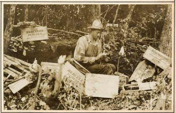 In this photo, we see one of No. 14’s crewmen preparing dynamite on the banks of the Scuppernong River, May 1931. Judging by the box labels, he was using dynamite produced by the Hercules Powder Co. and the Atlas Powder Company, two of the three chemical and munitions companies that were formed when the federal courts broke up DuPont’s munitions monopoly in 1911-12. Dynamite was widely used in river dredging. In this case, the No. 14’s crew was blasting a point that protruded into the river to make the river straighter and easier to navigate. In other cases, dredge crews used dynamite to clear tree stumps (usually the remnants of bald cypress swamps), out of river bottoms. This was most commonly done for the sake of navigation, but in some cases also to clear river or sound bottoms to make way for the establishment of a seine fishery. Even in the antebellum era, historical accounts refer to fishery owners forcing enslaved African American divers to lay explosive charges in submerged cypress stumps. (For more on that topic, see my book The Waterman’s Song.) Source: Office of History, HQ, U.S. Army Corps of Engineers