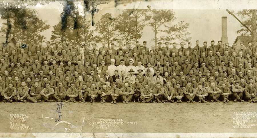 CCC Company 424 at Bell Island in Hyde County, N.C., ca. 1935. The first group of 200 young men to join Co. 424 participated in a two-week training session at Fort Bragg in June 1933. They then moved to Bell Island, on the shores of Rose Bay, on or about the 1st of July. From the Anthony Troy Elliott Photograph Collection, State Archives of North Carolina