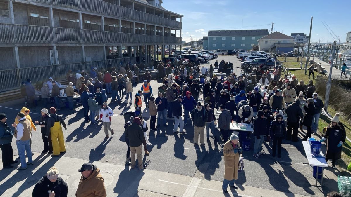 A crowd is gathered at a past Hatteras Island Oyster Roast. Photo: NC Coastal Federation