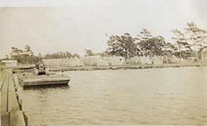 View from the pier that Co. 424 built on Rose Bay looking back to the camp’s tents, ca. 1935. The camp’s first enrollees came from seven counties in the piedmont and eastern parts of North Carolina: Brunswick, Durham, Granville, Halifax, New Hanover, Onslow, and Wilson. Within the year, a healthy contingent of the camp’s young men also came from Hyde County, where Bell Island is located. Photo courtesy, State Archives of North Carolina
