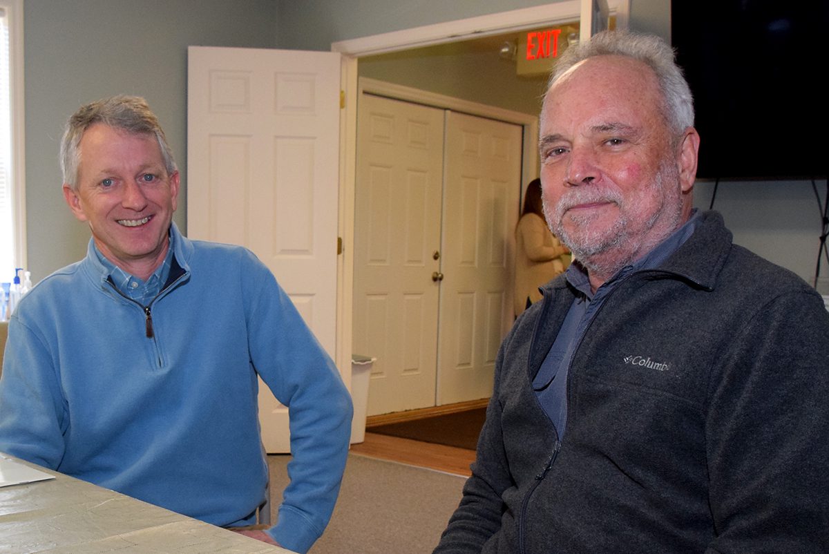 New North Carolina Coastal Federation Executive Director Braxton Davis, left, chats with the organization's founder and outgoing director Todd Miller Thursday at the organization's headquarters near Newport. Photo: Mark Hibbs